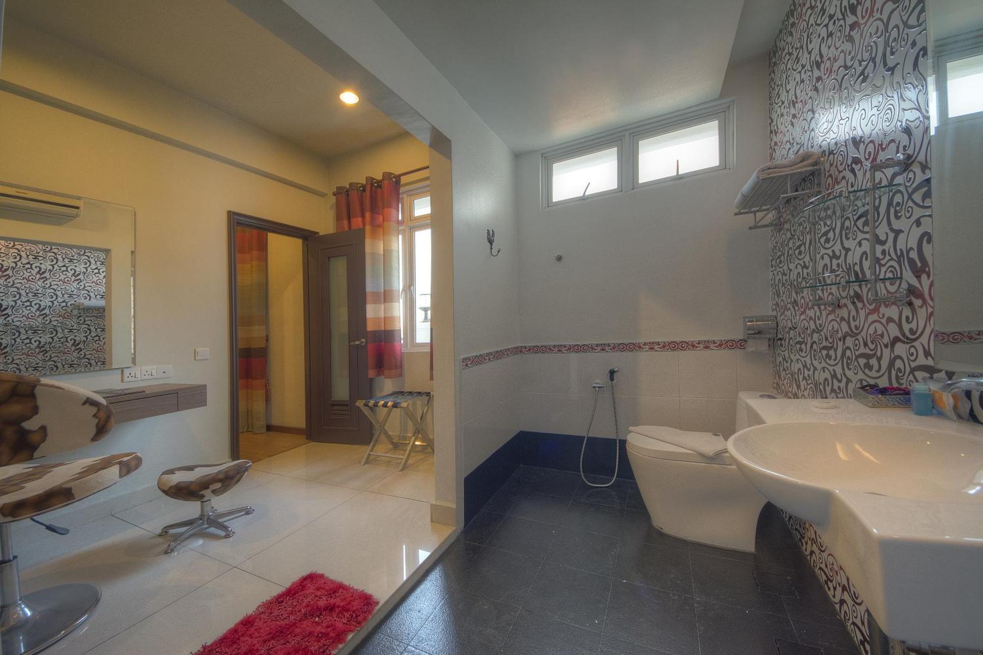 Arenaa Deluxe Hotel Malacca Szoba fotó
