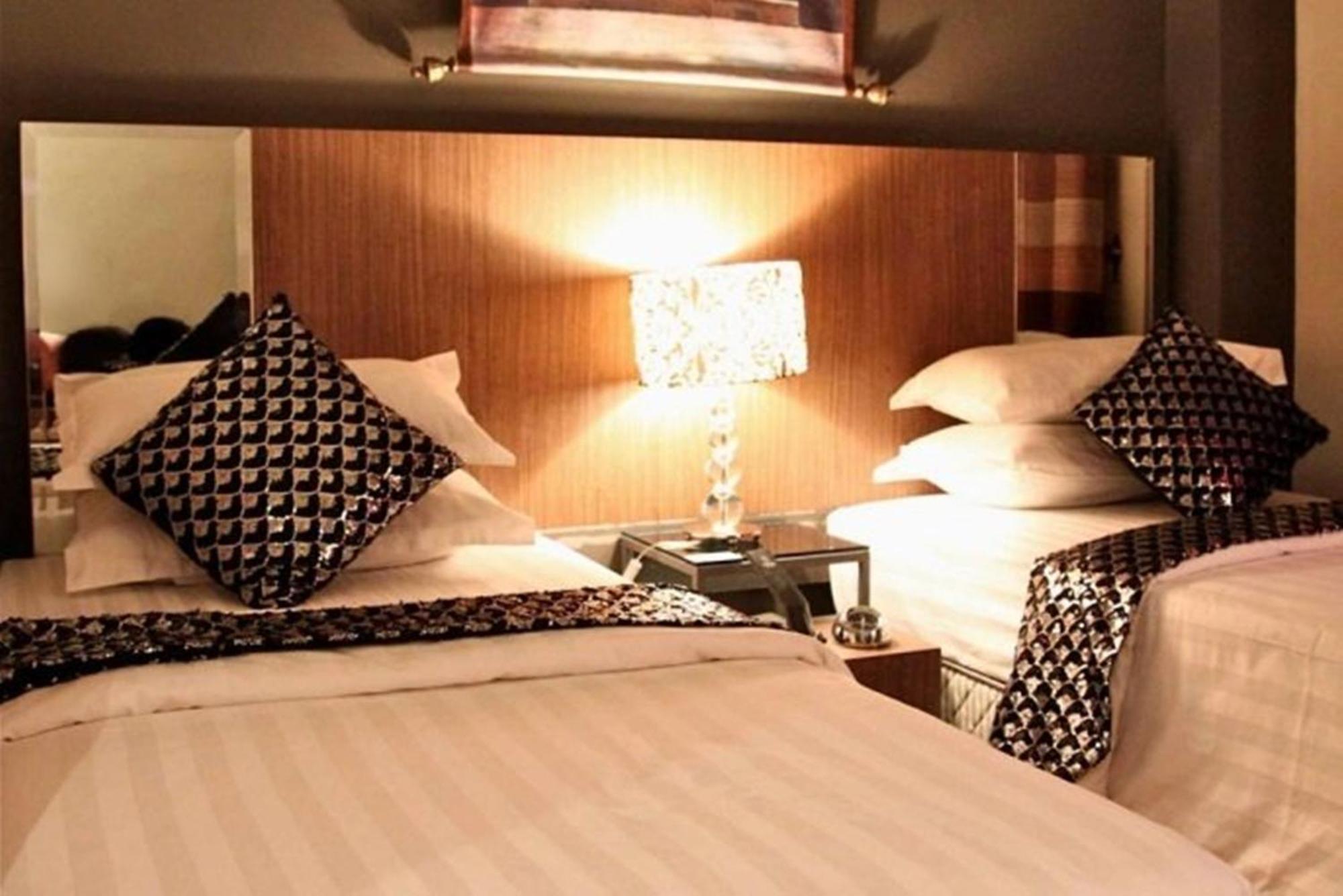 Arenaa Deluxe Hotel Malacca Szoba fotó