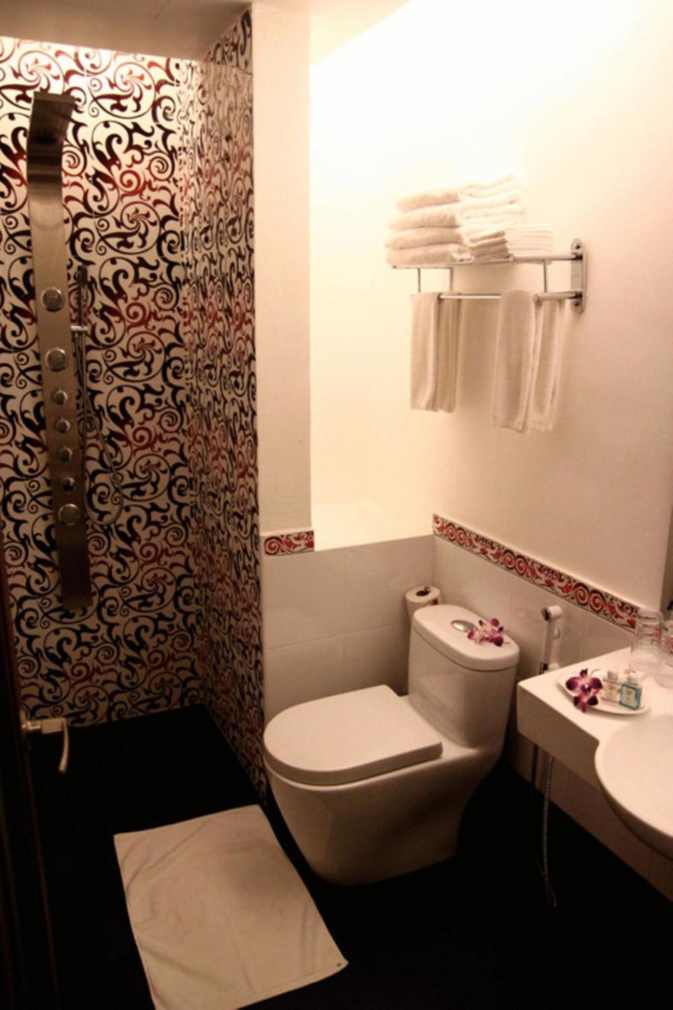 Arenaa Deluxe Hotel Malacca Szoba fotó